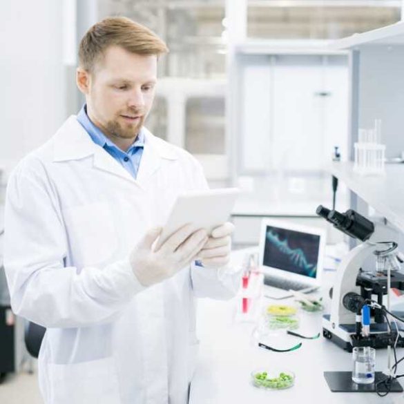 modern-scientist-using-tablet-in-laboratory-e1621063231490